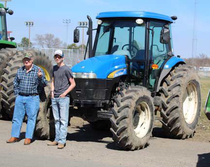 Tractor-grandpa and grandson